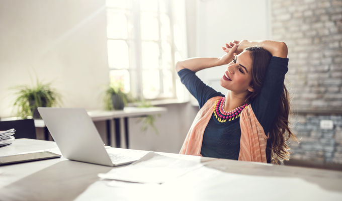 Woman with laptop open